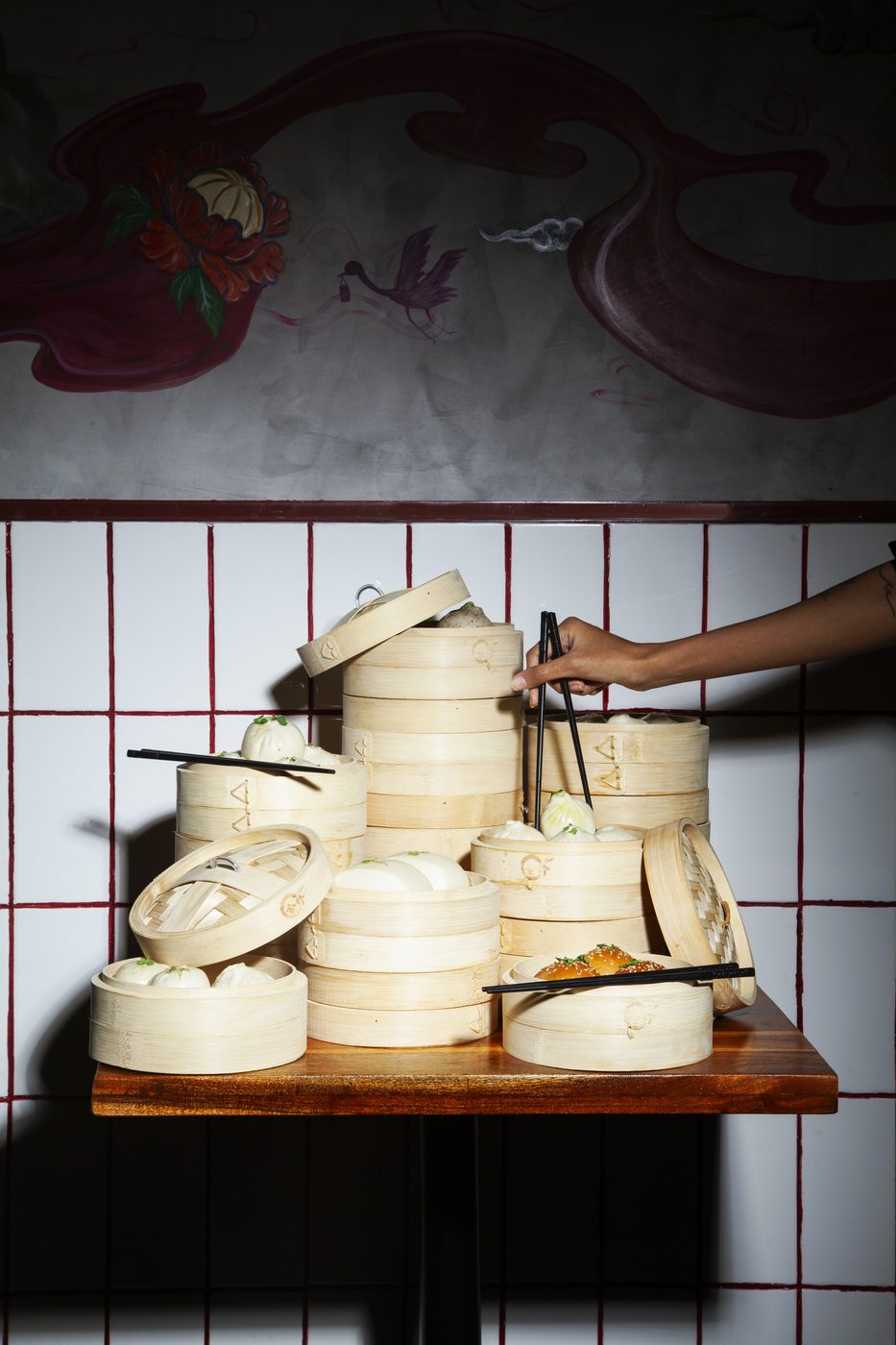 Bao To Me interior detail — layered Southeast Asian alleyway décor